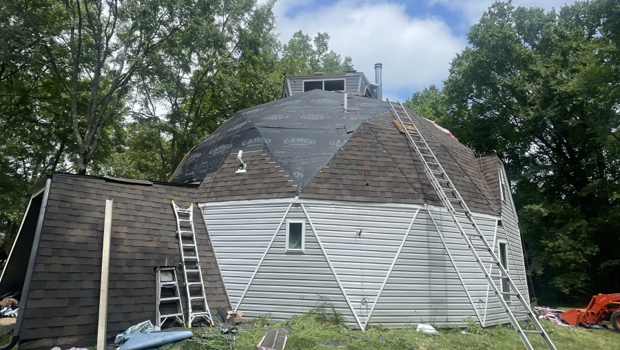 Geodesic dome home being re-roofed with synthetic underlayment near Memphis, Tennessee